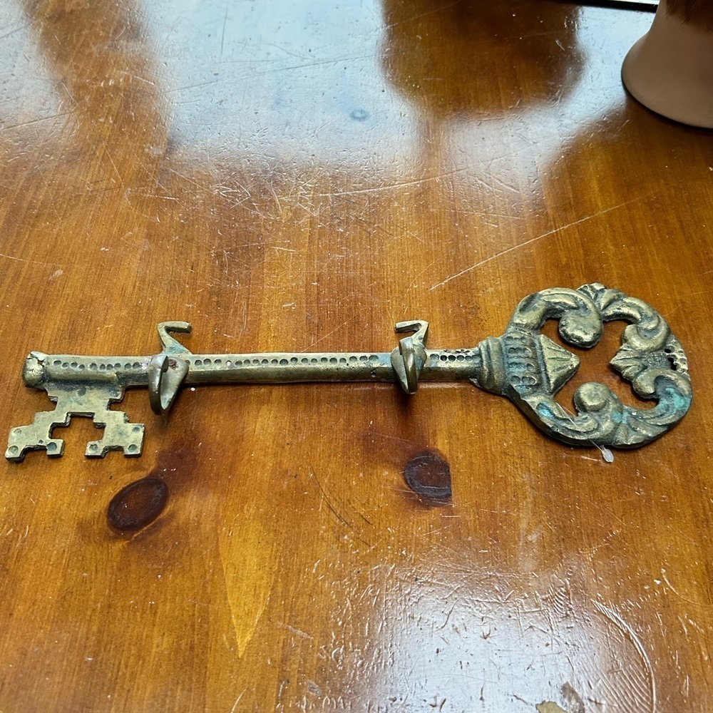 Antique Brass Key Wall hanging to hang keys on- very heavy- about 14” long-